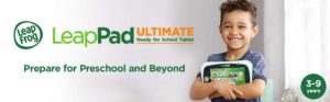 The picture of a very happy little boy, holding on to his leappad ultimate, fun learning tablet.