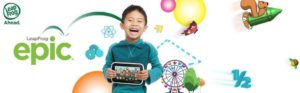 The picture of a very happy little boy, holding his leappad epic 7 fun learning tablet.