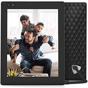 Amazon Fire HD 8, kids tablet. The picture of a Father and his two sons playing on the coach.