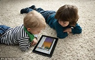 The Best Toddler Tablet With Fun Educational Games. The colorful illustration of 2 children engaging a learning tablet.