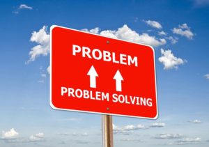 The colorful illustration of a sign depicting problem and arrows pointing upward stating problem solving.