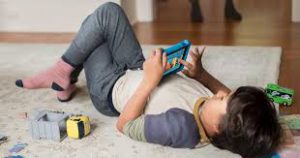 The colorful picture of a little boy engaging his fun learning tablet. Kids Electronic Learning Toys Engaging Amazon Fire HD Kids Tablets