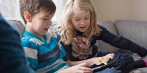 The picture of a little boy and girl on there fun learning device. Fun Learning Devices Associates Reviews More Kids Early Learning Games